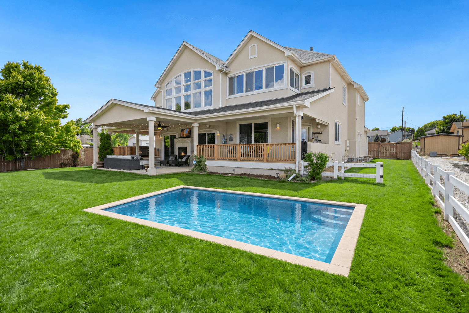 Edited property photograph with an added swimming pool