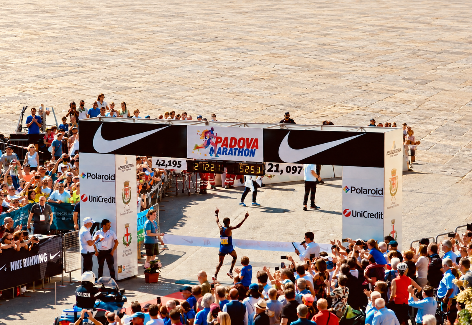 Prepared marathon photograph showing a finish clock at 2:12:21